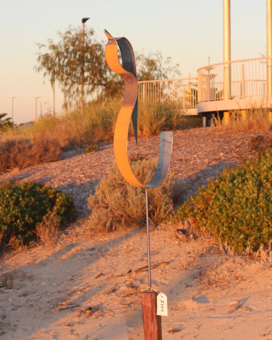 Large Bird on Post